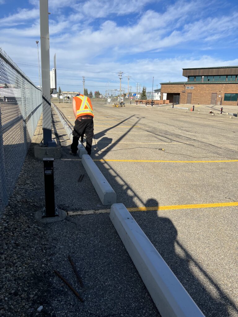 Man Working at the Parking Lot