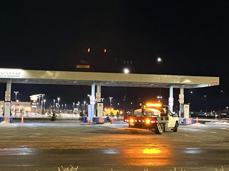 A Truck Parked at a Gas Station