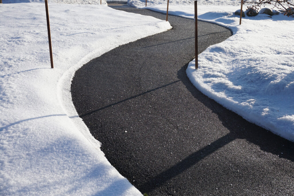 Winding Sidewalk After Snow With Snow Removed