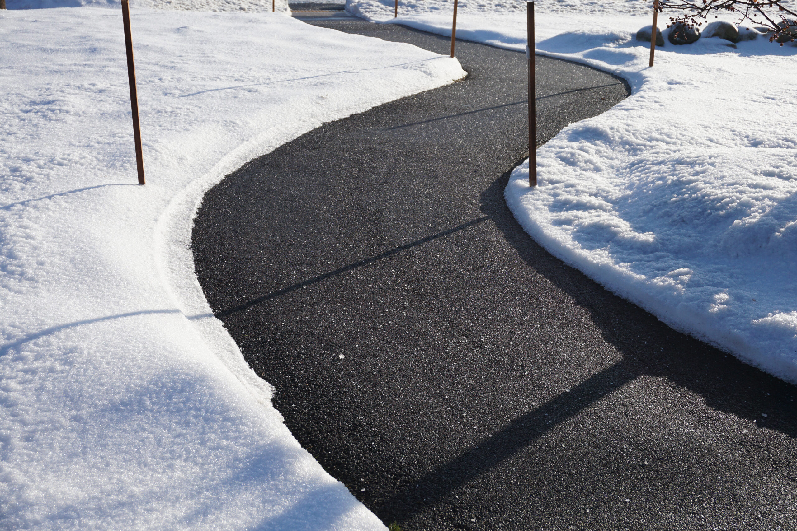 Winding Sidewalk After Snow With Snow Removed